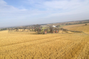 Spreading digestate onto spring barley stubble using the Saddletrac tanker near Wallingford